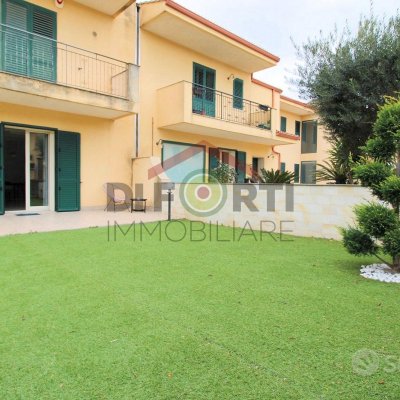 Appartamento con Veranda e Giardino Privato